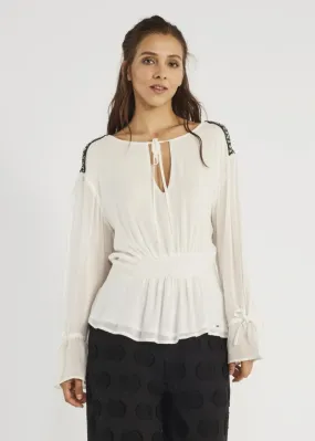 Blusa con peplo