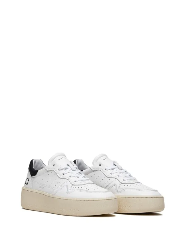 White women's sneaker in leather and contrasting sole