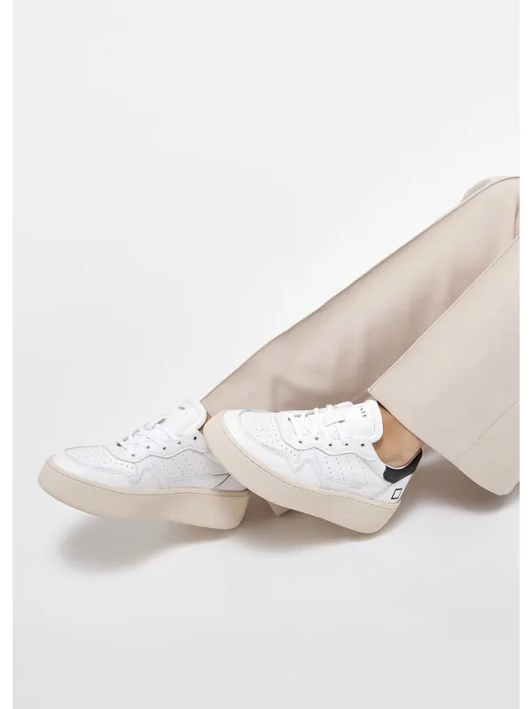 White women's sneaker in leather and contrasting sole